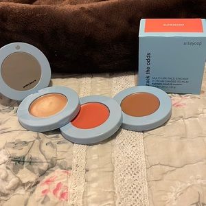 Stack the odds highlight/blush/contour compact in shade Sunkissed.